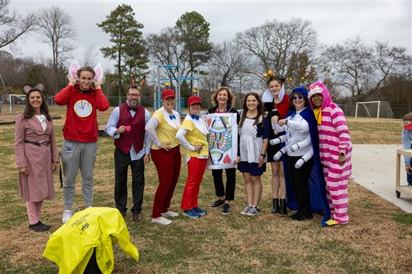 group of teachers in costumes